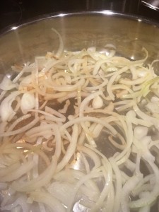 As soon as onions begin to stick and brown, add a bit of liquid and move them around, scraping up the browning.